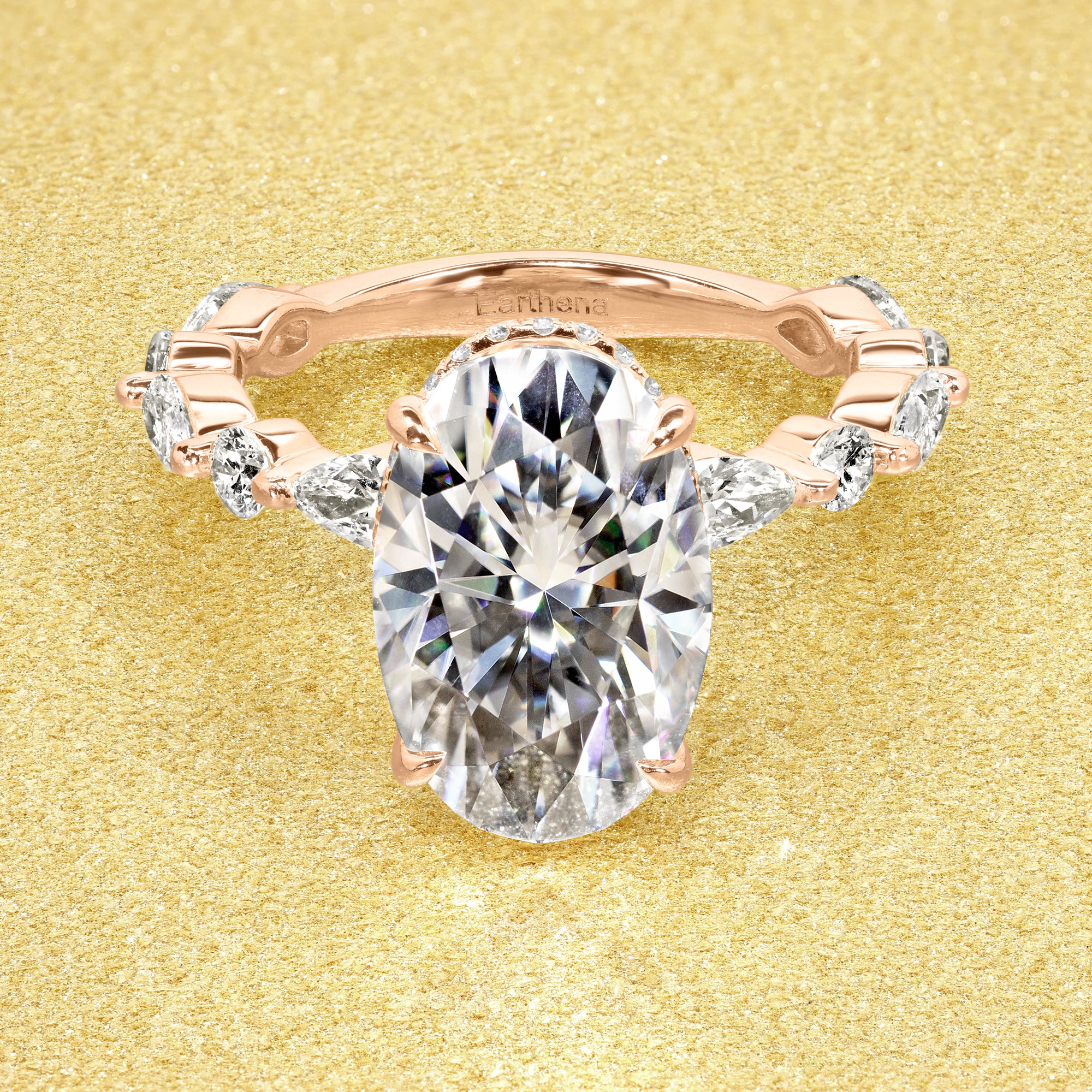 Classic Grace 4.75ct Oval Brilliant-cut Moissanite Hidden Halo Floating Marquise and Round Lab-grown Diamond Engagement ring in 14K gold, 18K gold, or Platinum handcrafted in Los Angeles by Earthena Jewelry.