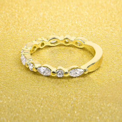 This Grace Floating Marquise and Round Brilliant-cut Lab-grown Diamond Semi-eternity Band is Handcrafted in White, Yellow, or Rose Gold with a high polish finished in 14K or 18K gold by Earthena Jewelry
