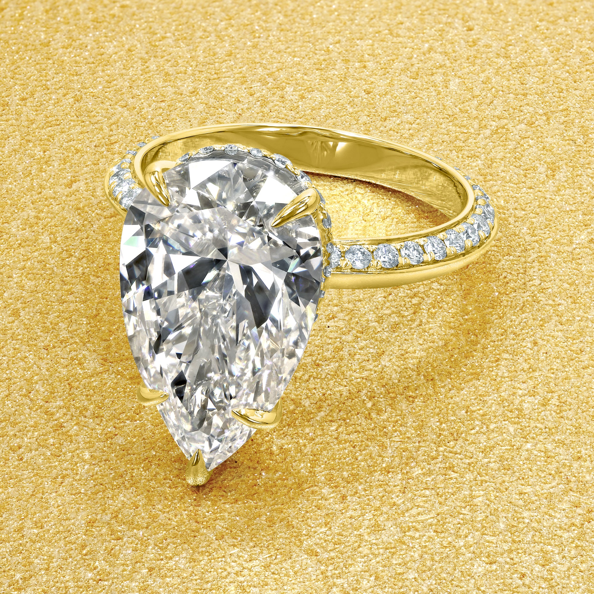 Axis 5ct Pear-Shaped Lab-Grown Diamond Knife-Edge Engagement Ring in 14K Gold, 18K Gold, or Platinum by Earthena Jewelry of Beverly Hills.