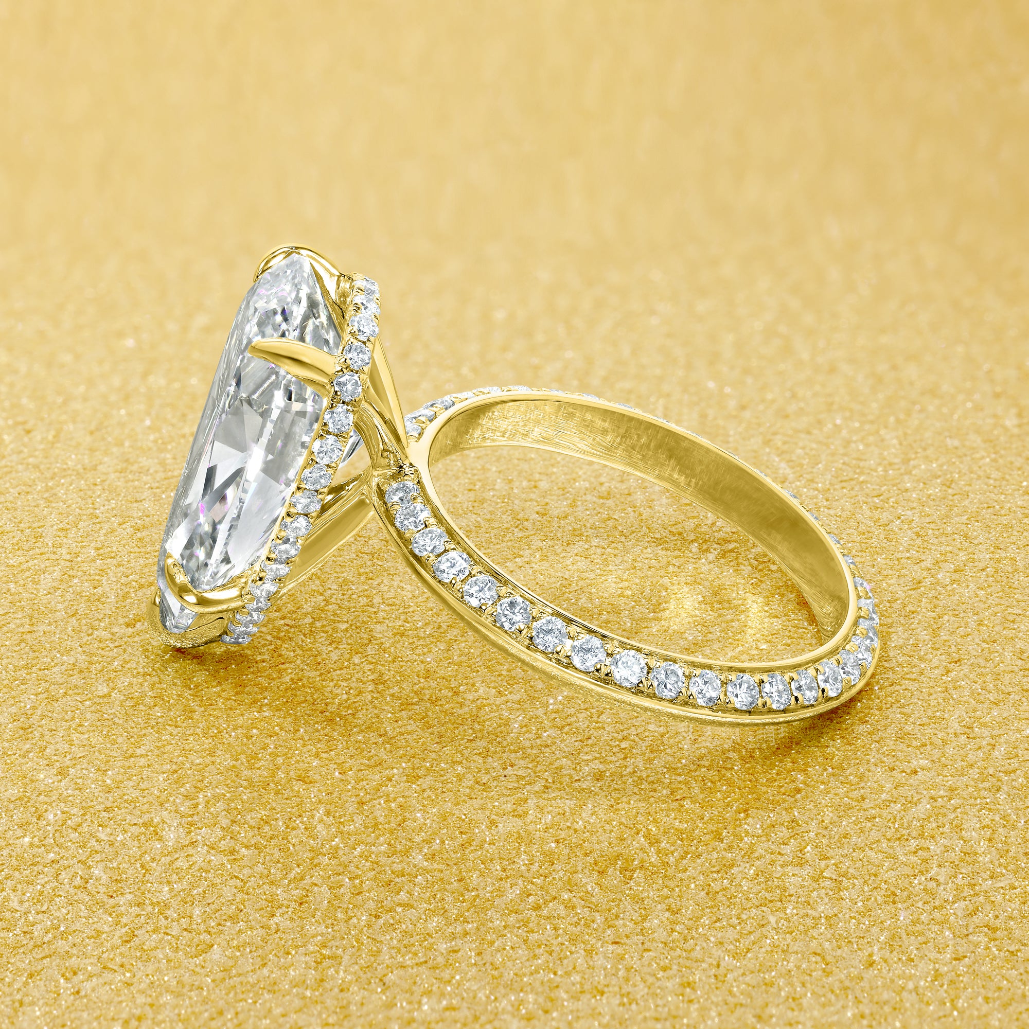 Axis 5ct Pear-Shaped Lab-Grown Diamond Knife-Edge Engagement Ring in 14K Gold, 18K Gold, or Platinum by Earthena Jewelry of Beverly Hills.