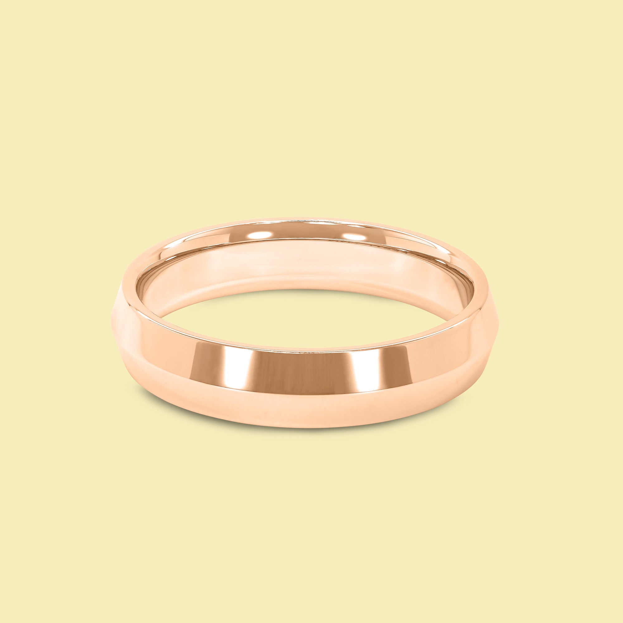 The Jett Solid Gold 5mm Knife Edge High Polish Comfort Fit Men's Wedding Band in 14K Gold, 18K Gold, or Platinum by Earthena Jewelry of Beverly Hills.