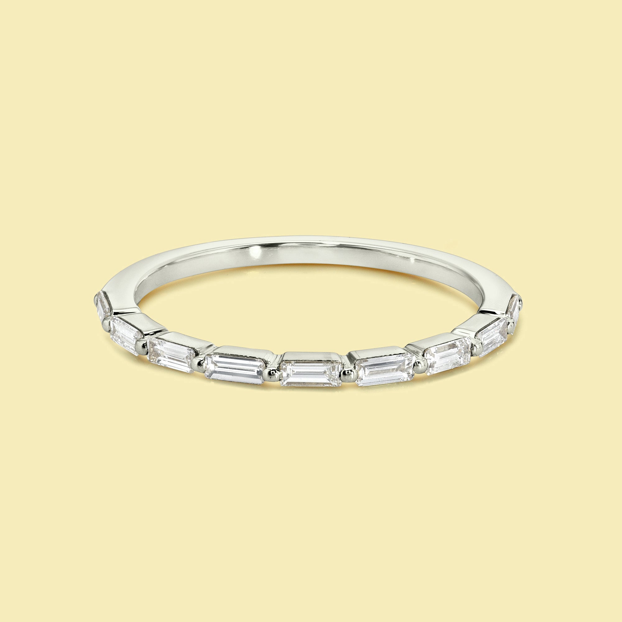 Laci Floating Stackable Shared-prong Diamond Band Handcrafted in 14K gold, 18K gold, or Platinum handcrafted in Los Angeles by Earthena Jewelry