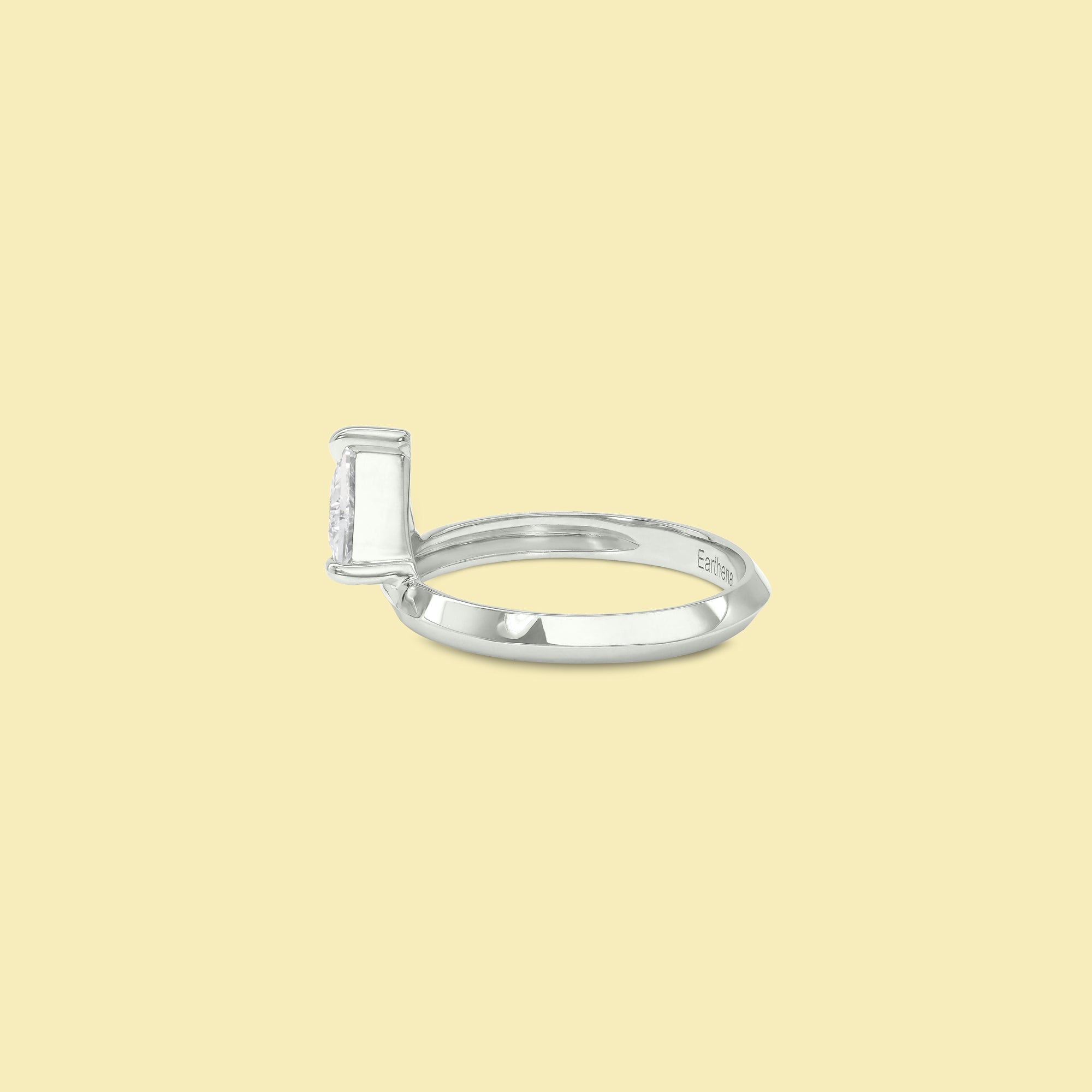 Lexi Floating Trillion Lab-grown Diamond Knife-Edge Pinky Ring Crafted in Gold or in Platinum by Earthena Jewelry of Beverly Hills.