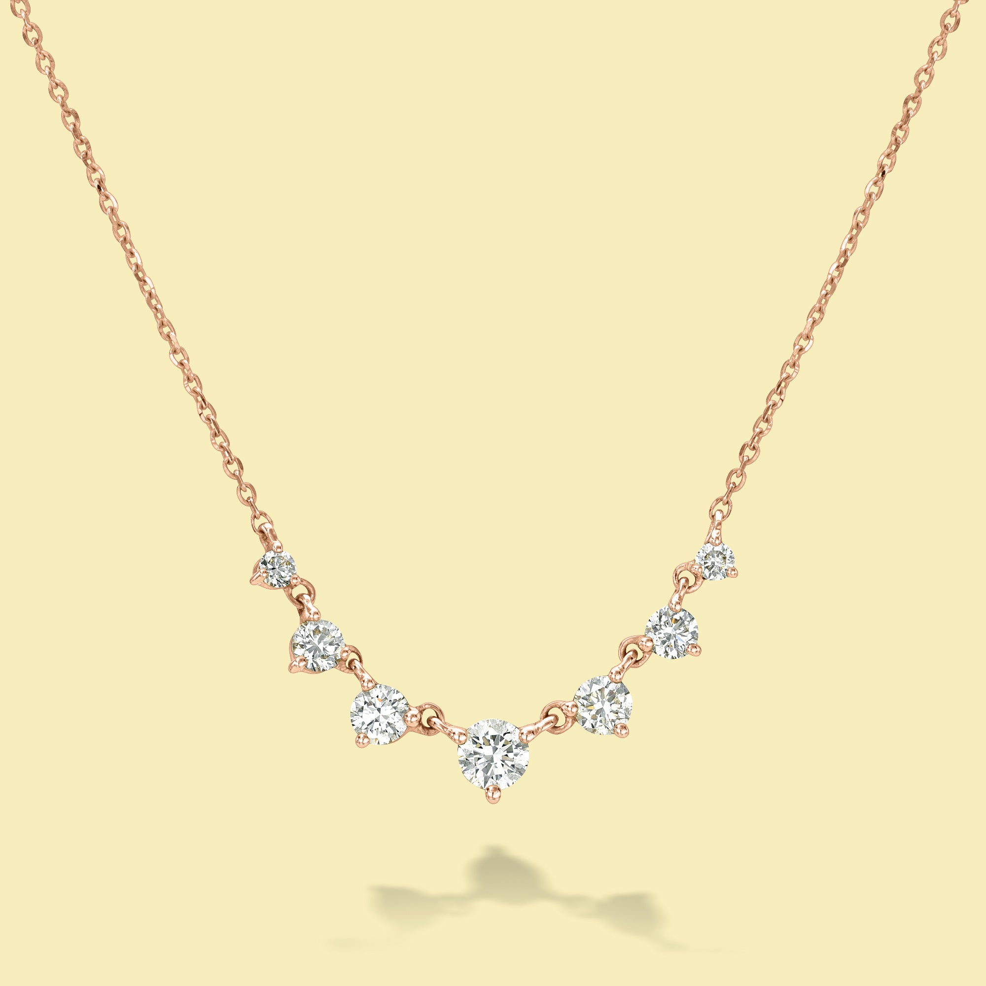 The Naomi, Graduated 7-Stone Diamond Necklace is handcrafted in 14K Gold, 18K Gold, or Platinum by Earthena Jewelry in Los Angeles