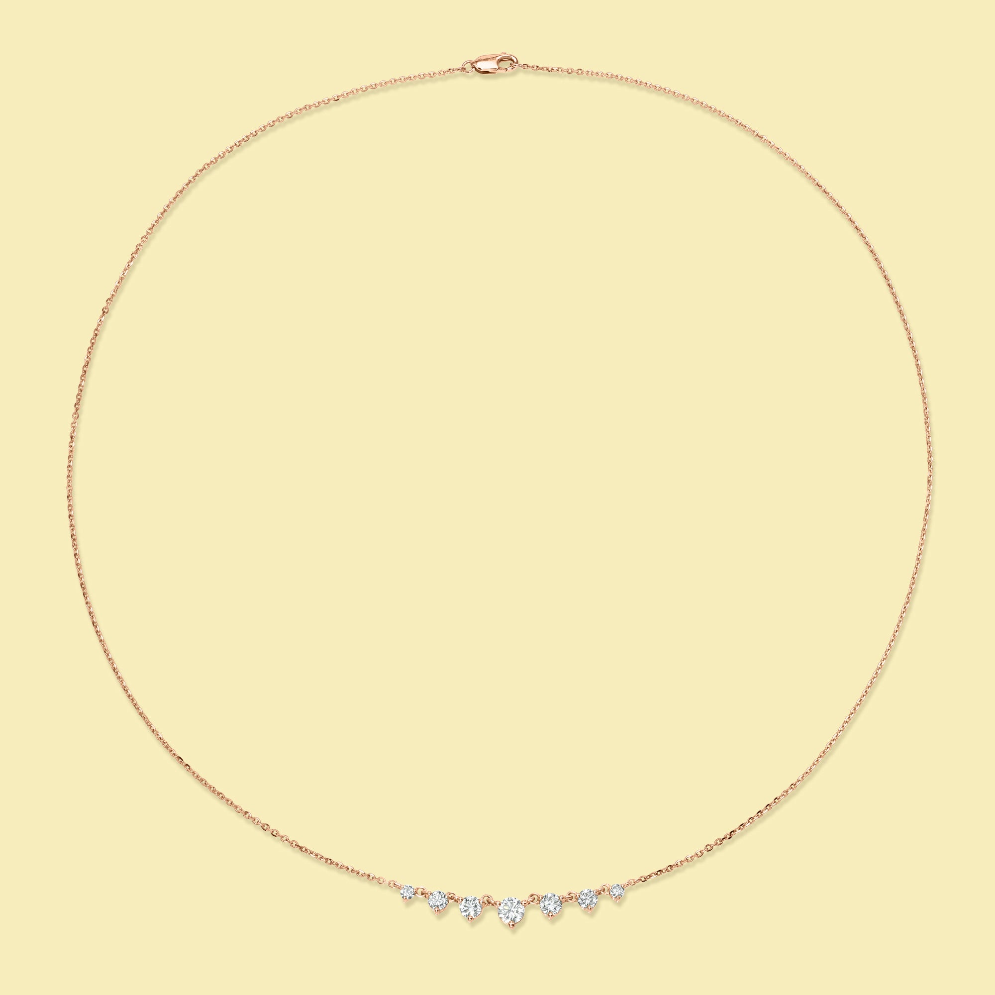 The Naomi, Graduated 7-Stone Diamond Necklace is handcrafted in 14K Gold, 18K Gold, or Platinum by Earthena Jewelry in Los Angeles