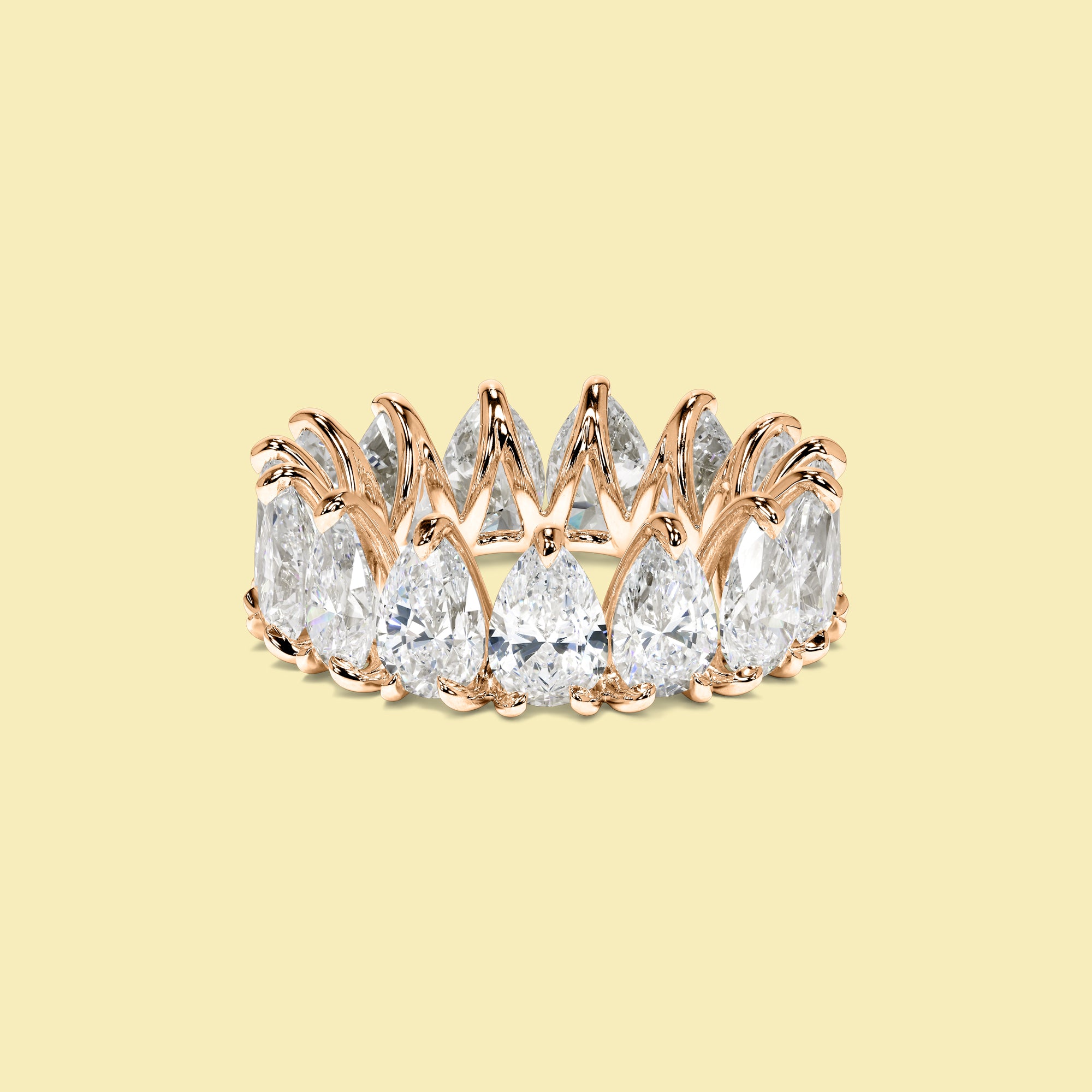 The Naomi Pear Eternity Band is handcrafted in 14K gold, 18K gold, or Platinum by Earthena Jewelry of Beverly Hills.