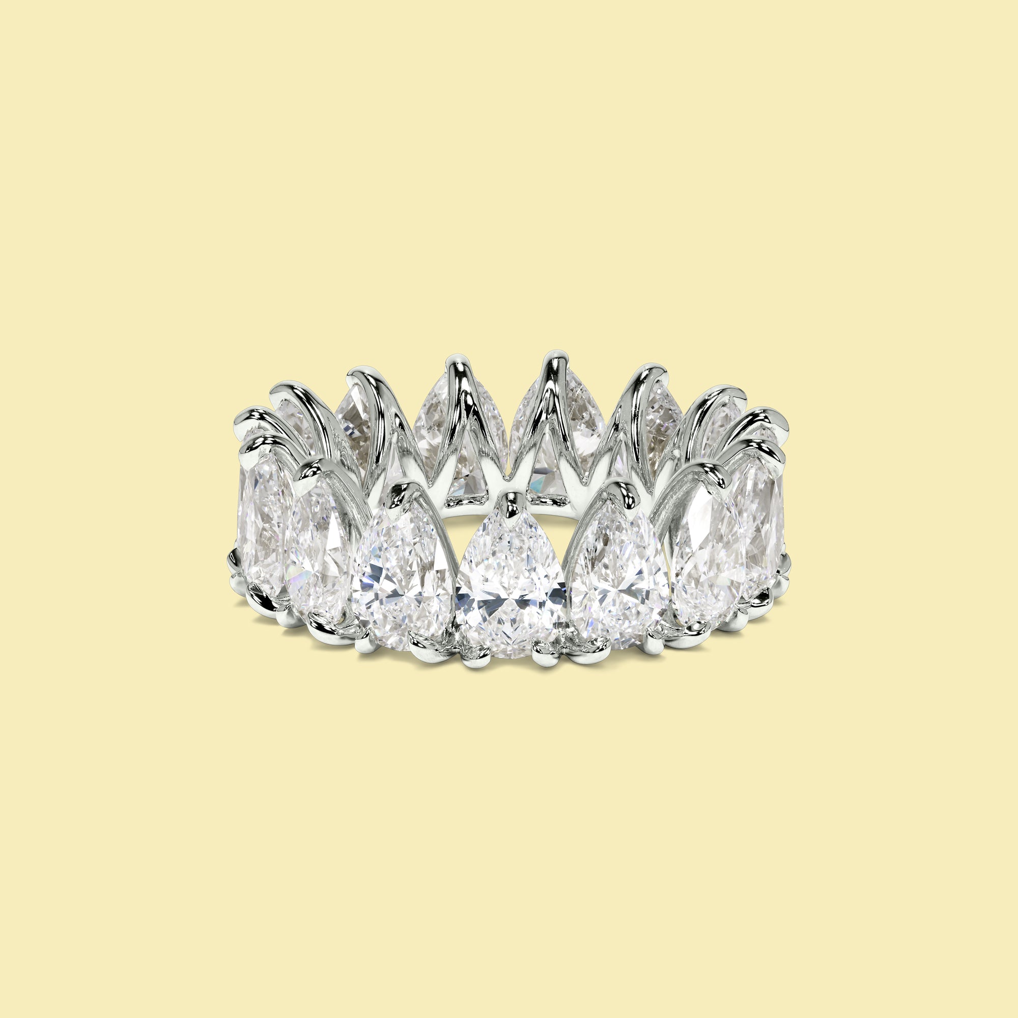 The Naomi Pear Eternity Band is handcrafted in 14K gold, 18K gold, or Platinum by Earthena Jewelry of Beverly Hills.