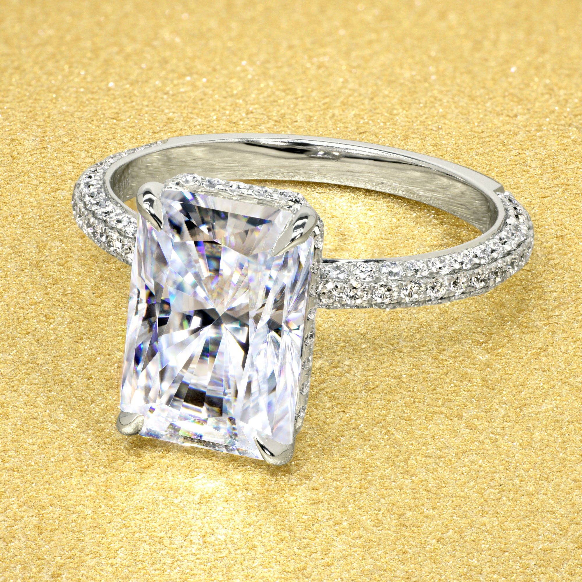 Classic Olivia 4.5ct Elongated Radiant-cut Moissanite Triple Row Hidden Wrap Halo Lab-grown Diamond Engagement ring in 14K gold, 18K gold, or Platinum handcrafted in Los Angeles by Earthena Jewelry.