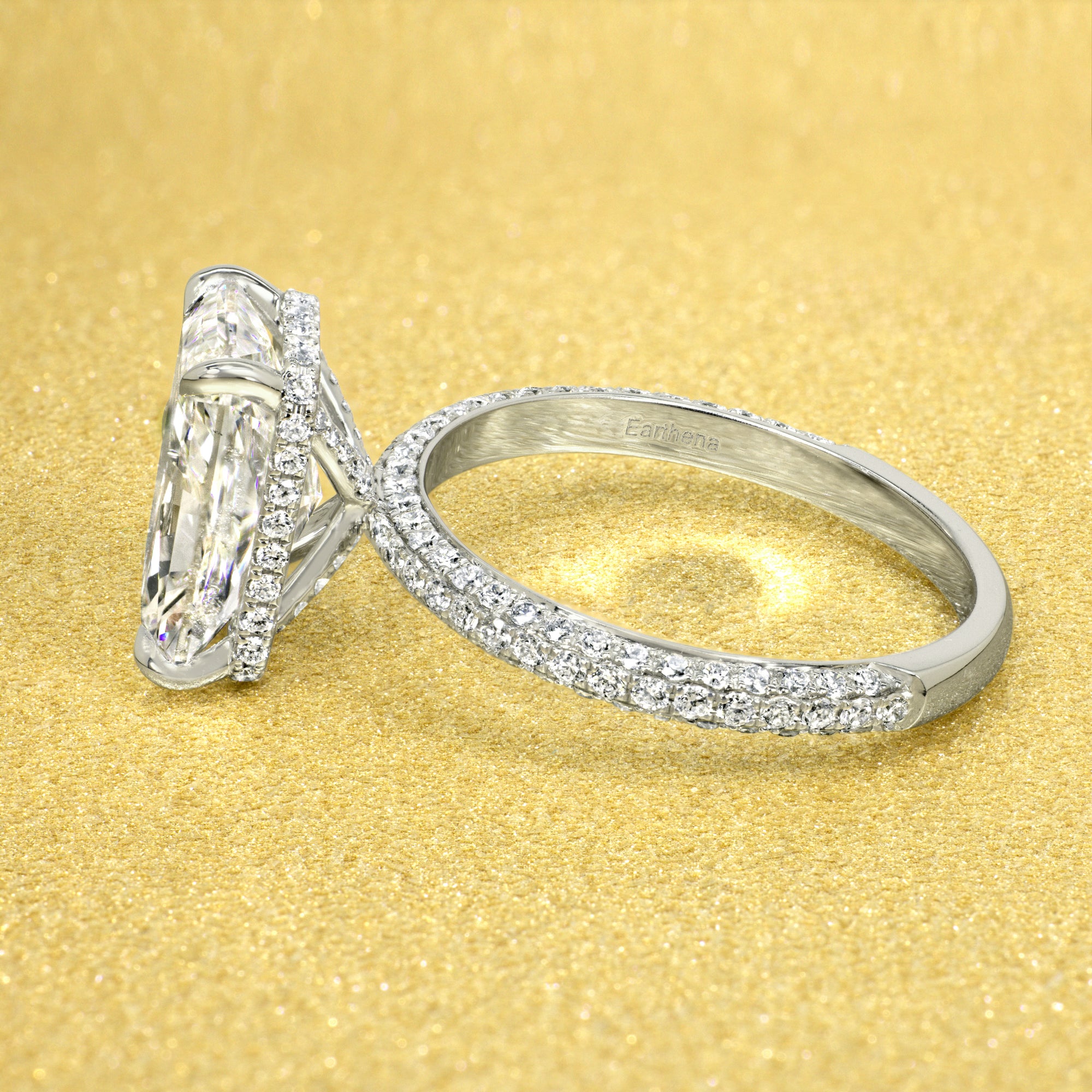 Classic Olivia 4.5ct Elongated Radiant-cut Moissanite Triple Row Hidden Wrap Halo Lab-grown Diamond Engagement ring in 14K gold, 18K gold, or Platinum handcrafted in Los Angeles by Earthena Jewelry.