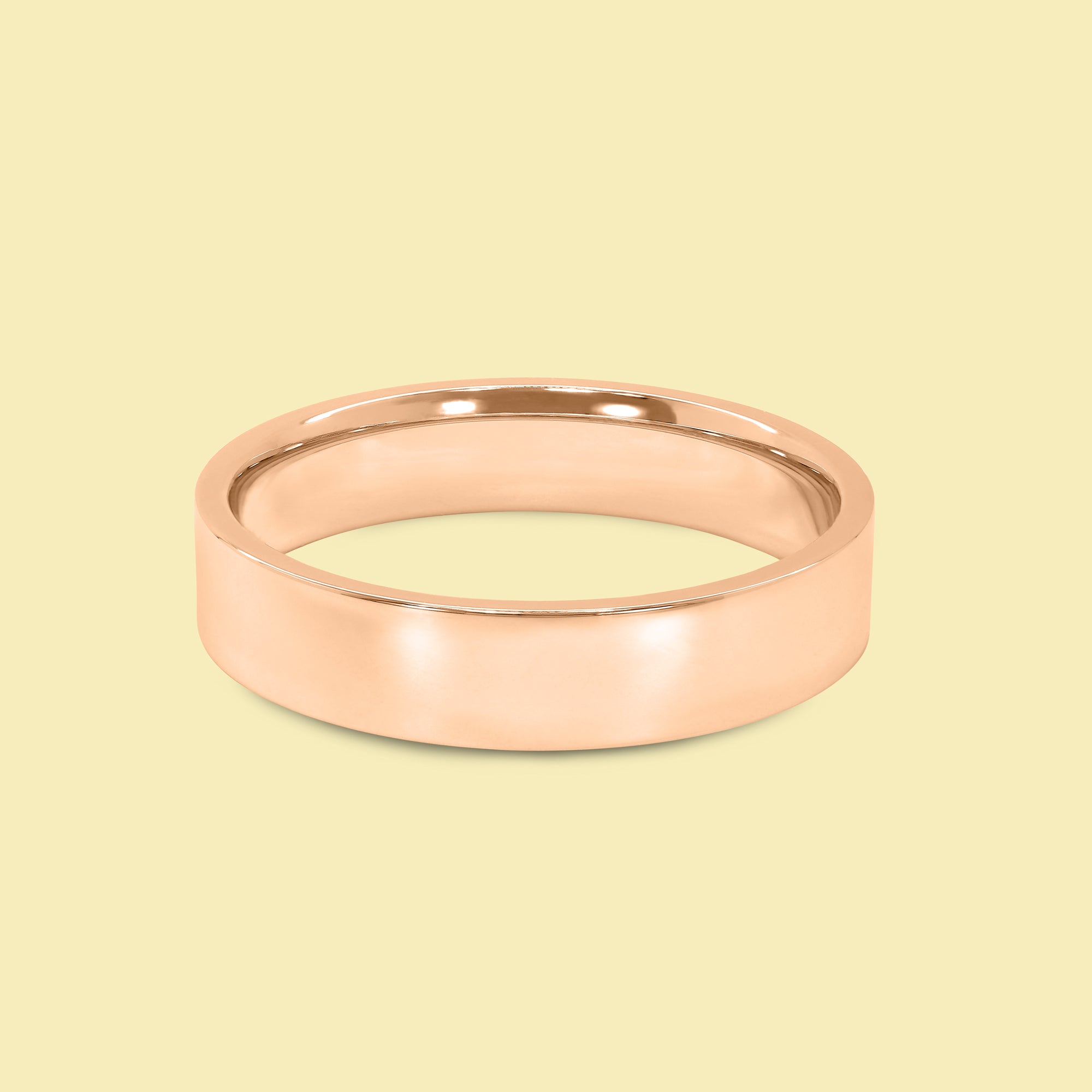 The Quinn Solid Gold 5mm Flat-Top Straight Edge Low Profile High Polish Comfort Fit Men's Wedding Band in 14K Gold, 18K Gold, or Platinum by Earthena Jewelry of Beverly Hills.