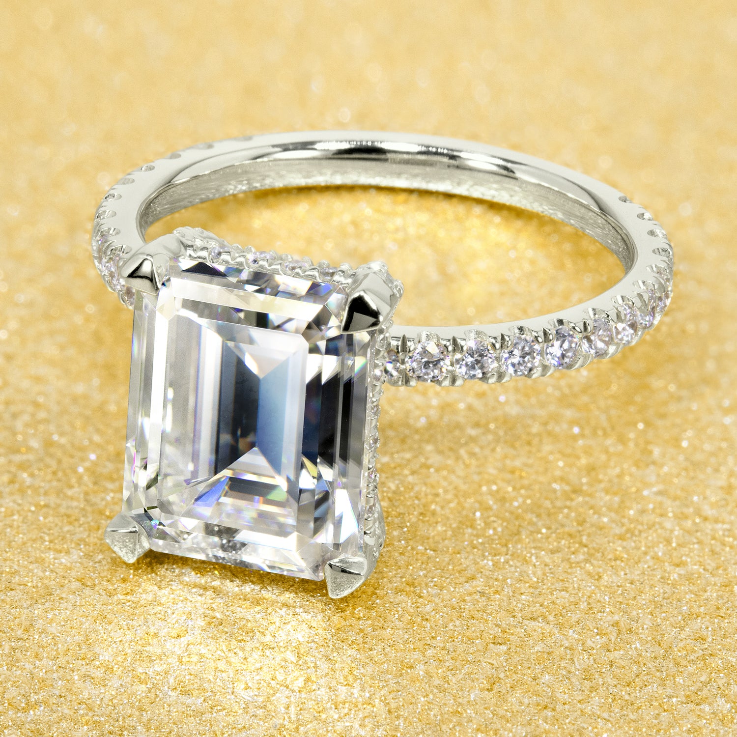 Classic and elegant 3.5-carats Emerald-cut Moissanite and Lab Diamond Hidden Wrap Halo engagement ring handcrafted in 14K gold, 18K gold, or Platinum handcrafted in Los Angeles by Earthena Jewelry