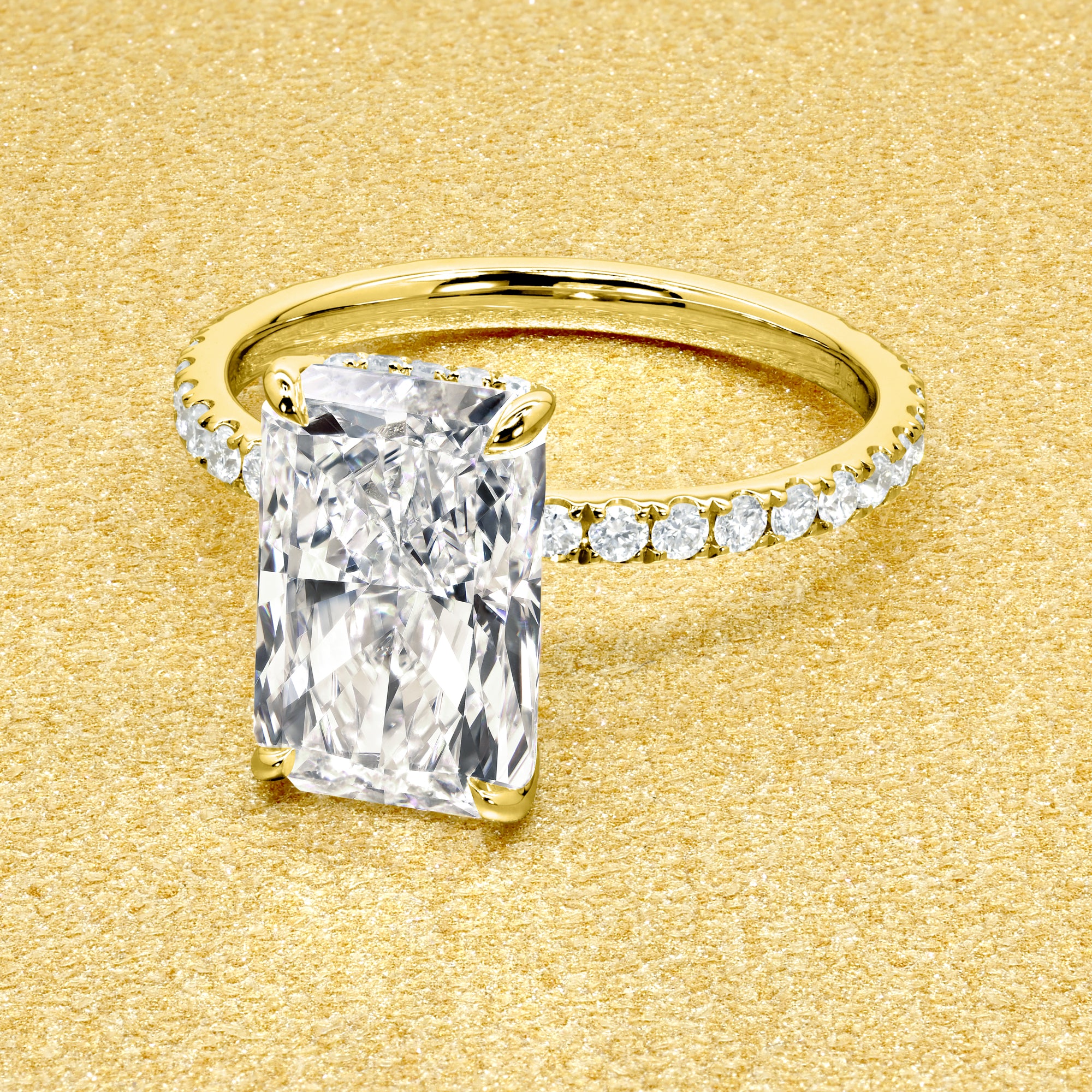 Classic Selina 3ct Elongated Radiant-Cut Lab-Grown Diamond Hidden Vow Halo Engagement Ring in 14K Gold, 18K Gold, or Platinum by Earthena Jewelry of Beverly Hills.