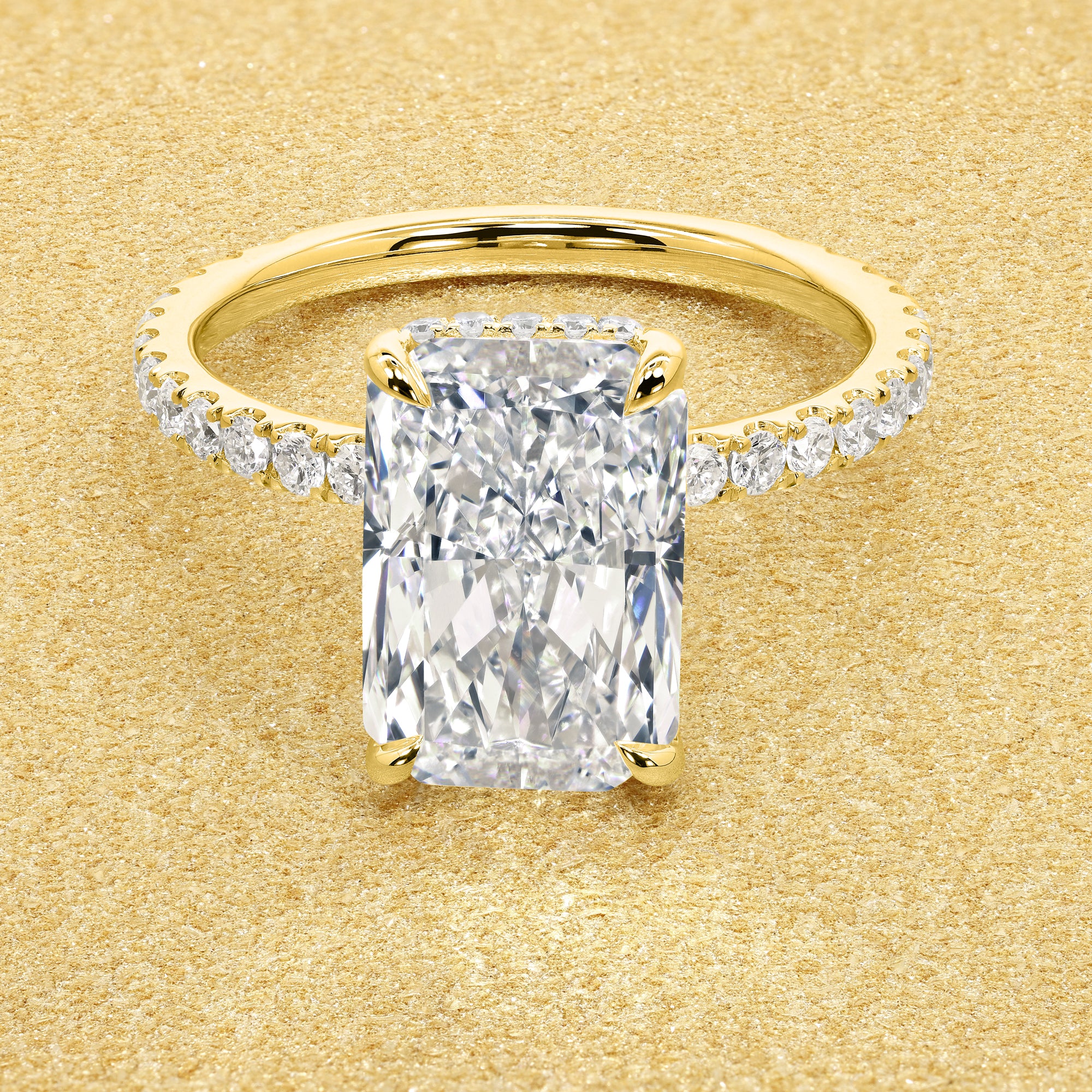 Classic Selina 3ct Elongated Radiant-Cut Lab-Grown Diamond Hidden Vow Halo Engagement Ring in 14K Gold, 18K Gold, or Platinum by Earthena Jewelry of Beverly Hills.