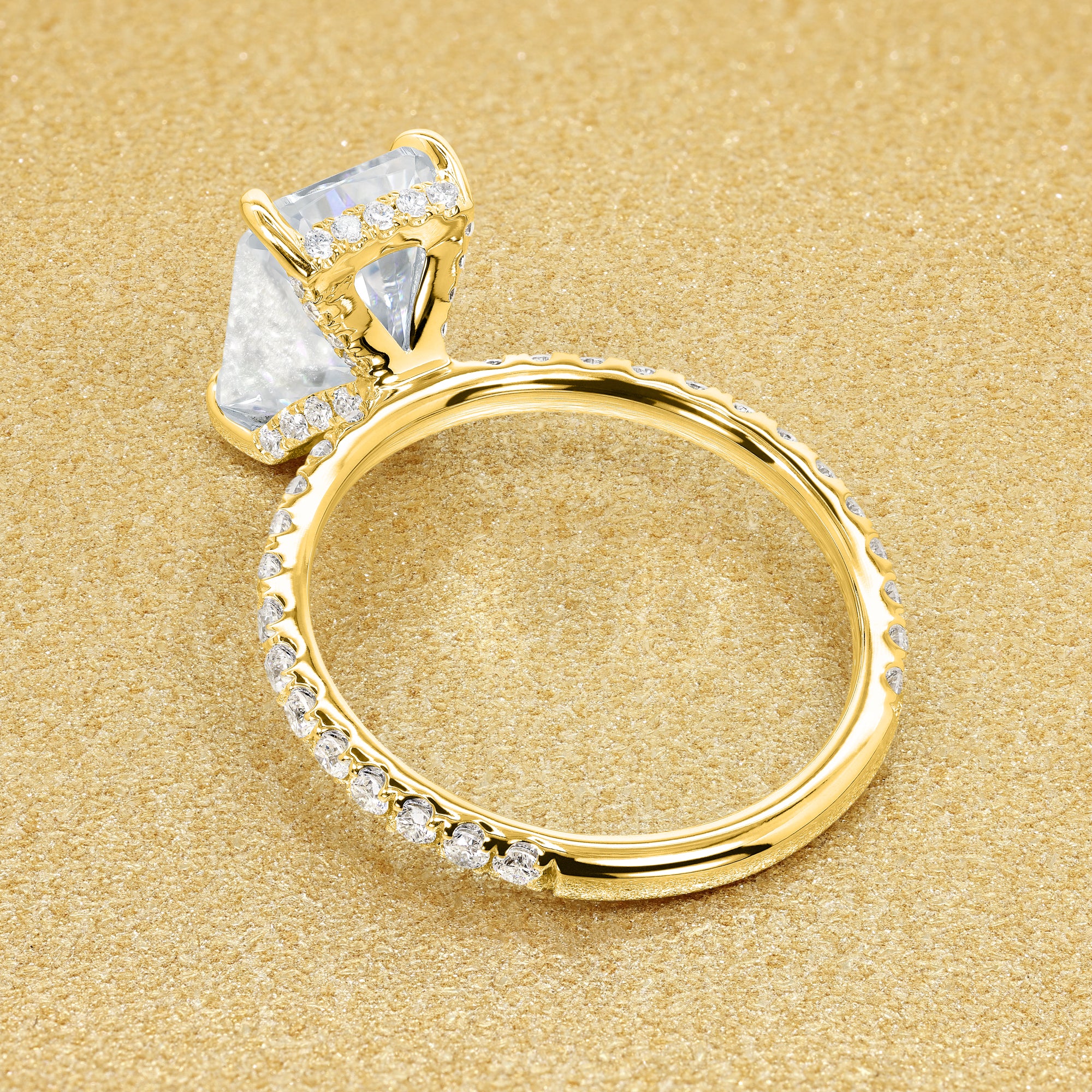Classic Selina 3ct Elongated Radiant-Cut Lab-Grown Diamond Hidden Vow Halo Engagement Ring in 14K Gold, 18K Gold, or Platinum by Earthena Jewelry of Beverly Hills.