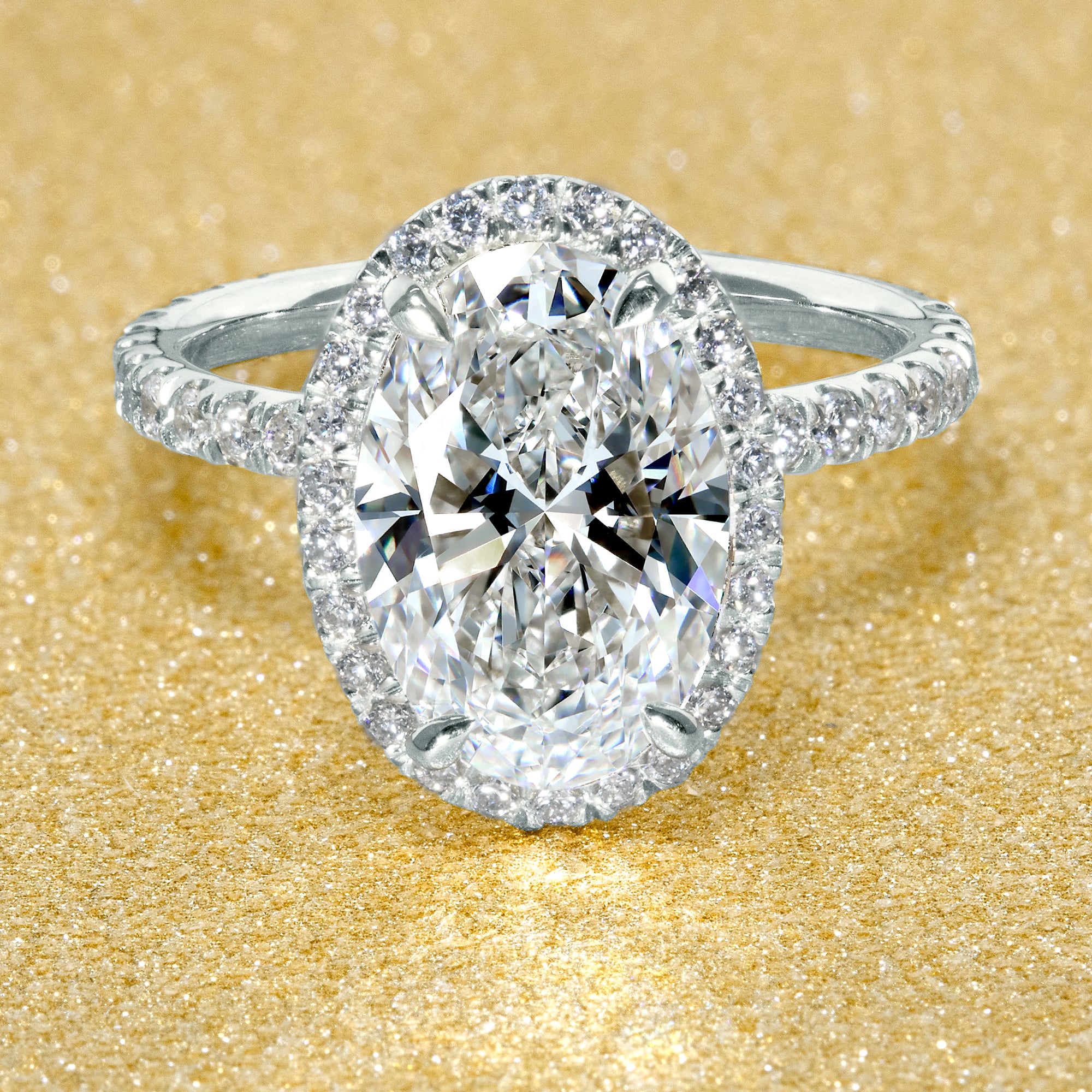 The Selina, 3ct Elongated Oval-Cut Lab-Grown Diamond Hidden Halo Engagement Ring in 14K Gold, 18K Gold, or Platinum by Earthena Jewelry of Beverly Hills.