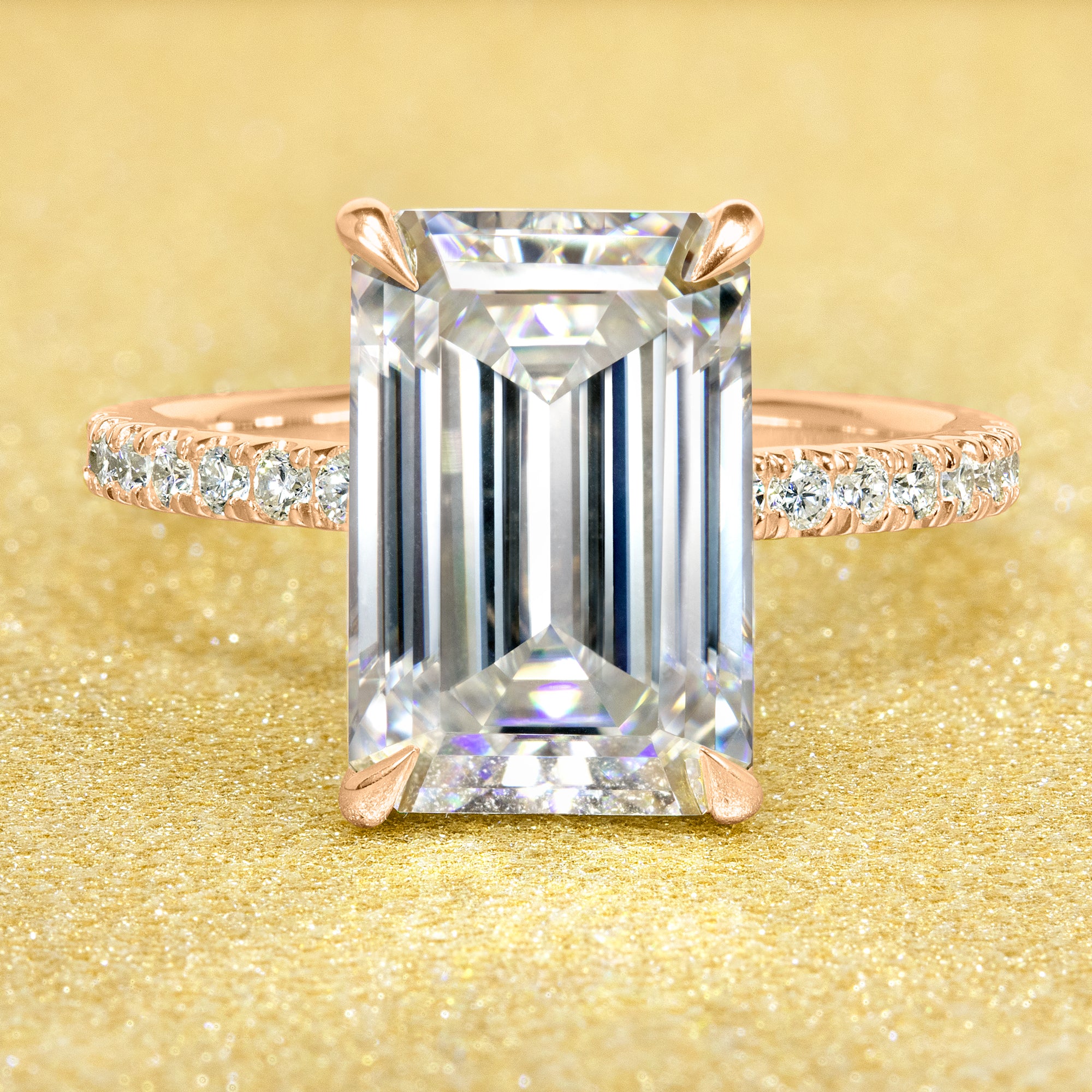 Classic Selina 5ct Elongated Emerald-Cut Lab-Grown Diamond Hidden Halo Engagement Ring in 14K Gold, 18K Gold, or Platinum by Earthena Jewelry of Beverly Hills.
