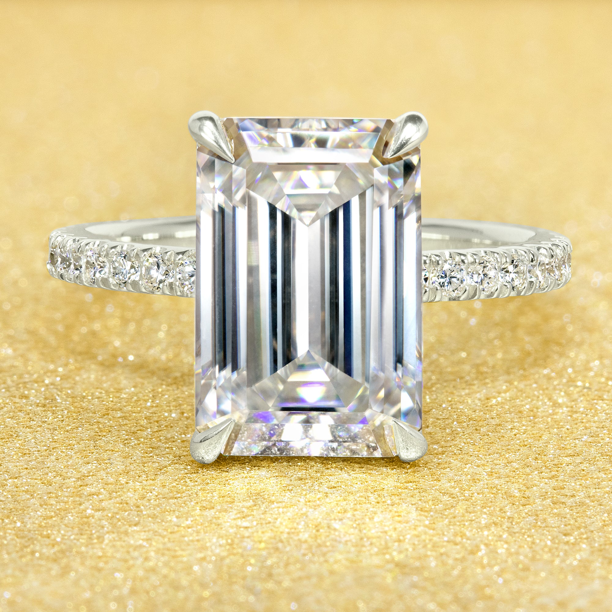 Classic Selina 5ct Elongated Emerald-Cut Lab-Grown Diamond Hidden Halo Engagement Ring in 14K Gold, 18K Gold, or Platinum by Earthena Jewelry of Beverly Hills.