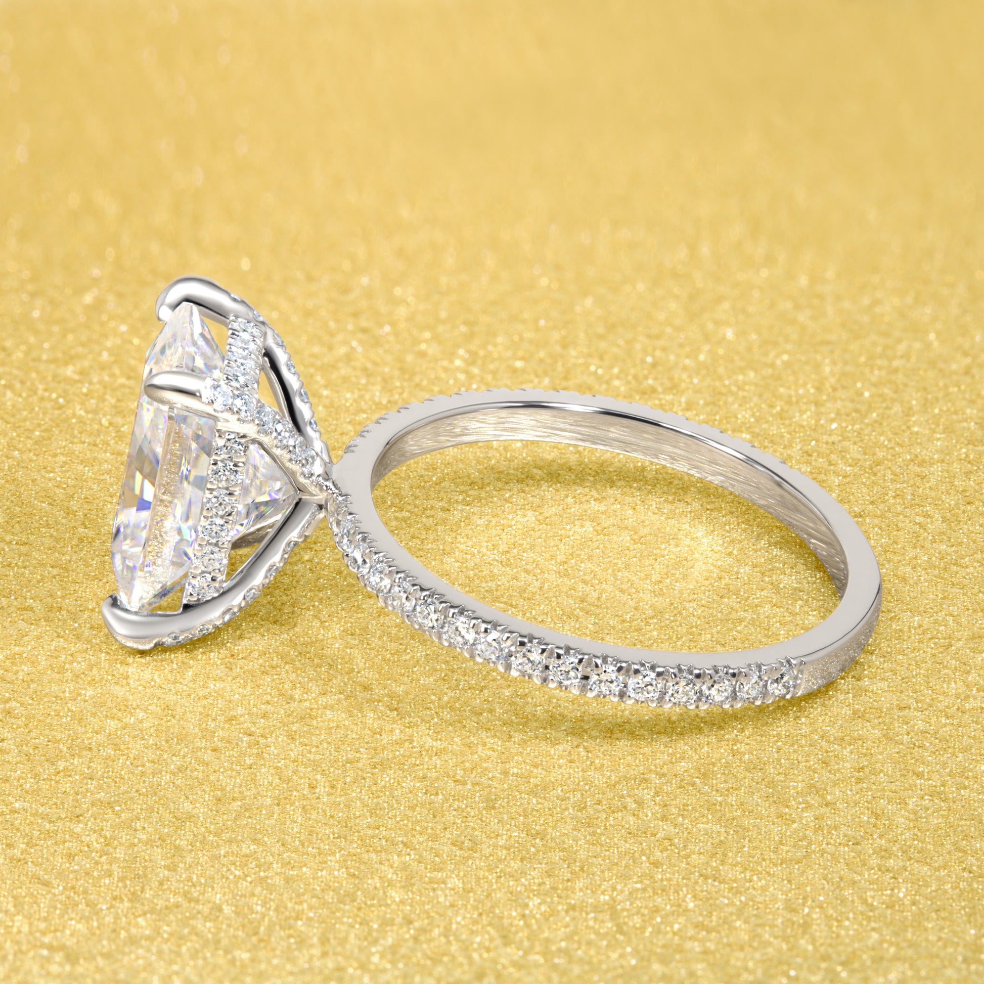 Stella 3.5ct Elongated Radiant-cut Moissanite and Lab-grown Diamond Hidden Wrap Halo Engagement Ring handcrafted in 14K or 18K Gold by Earthena Jewelry