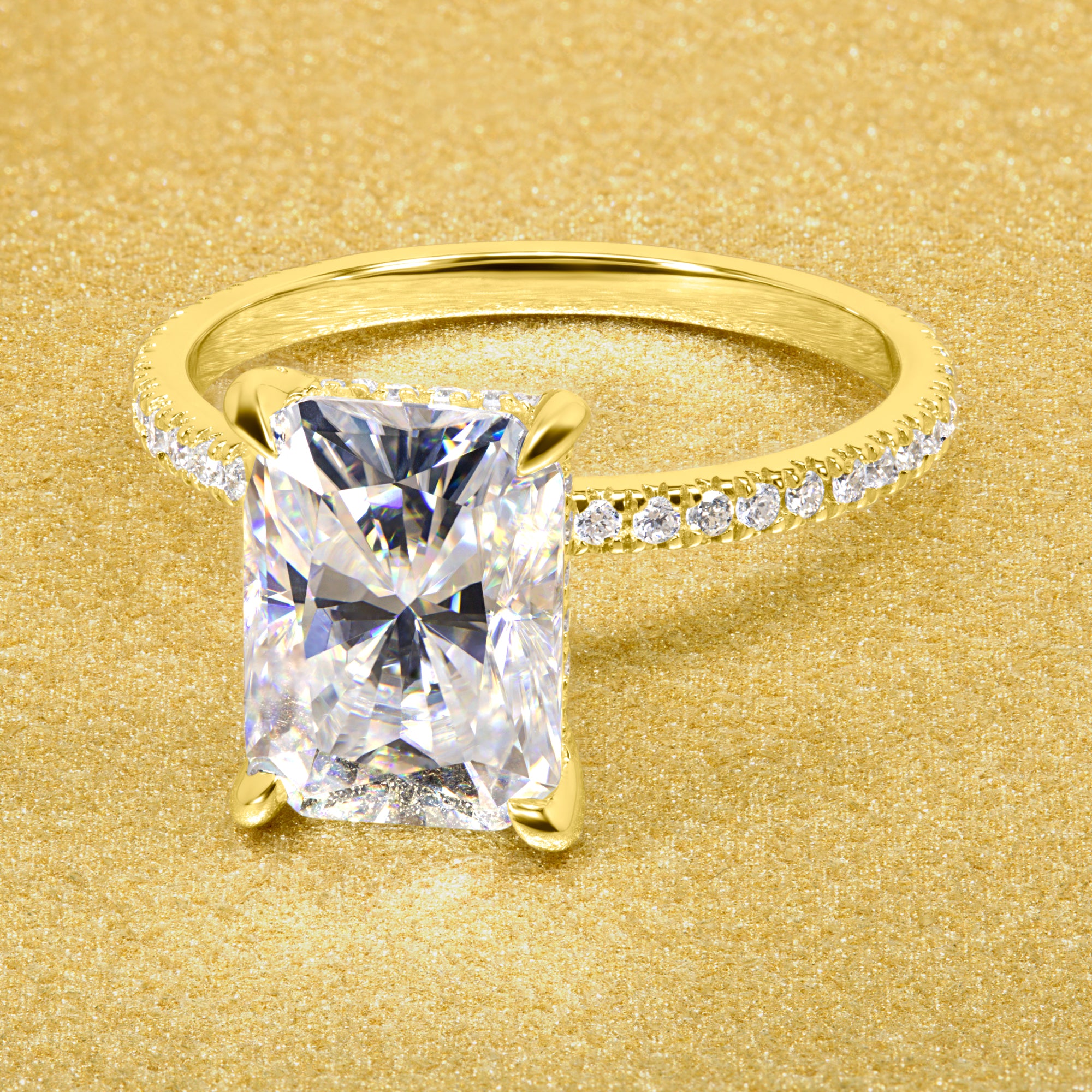 Classic Stella 3.5ct Elongated Radiant-cut Moissanite Hidden Wrap Halo and Lab-grown Diamond Engagement ring in 14K or 18K Gold handcrafted in Los Angles by Earthena Jewelry.