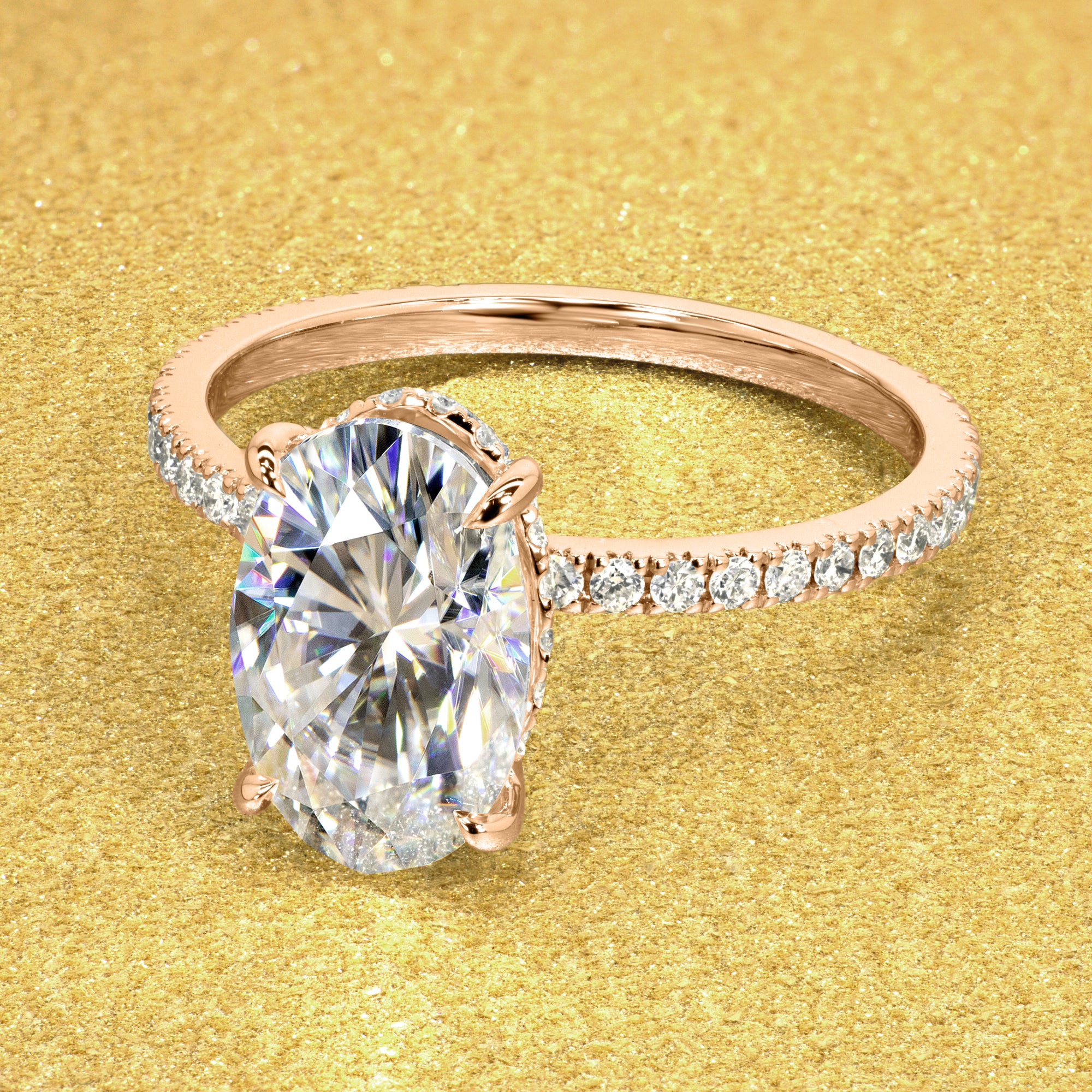 The Stella 3ct Elongated Oval-cut Moissanite and Lab-grown Diamond Hidden Halo Engagement Ring handcrafted in Beverly HIlls by Earthena Jewelry.