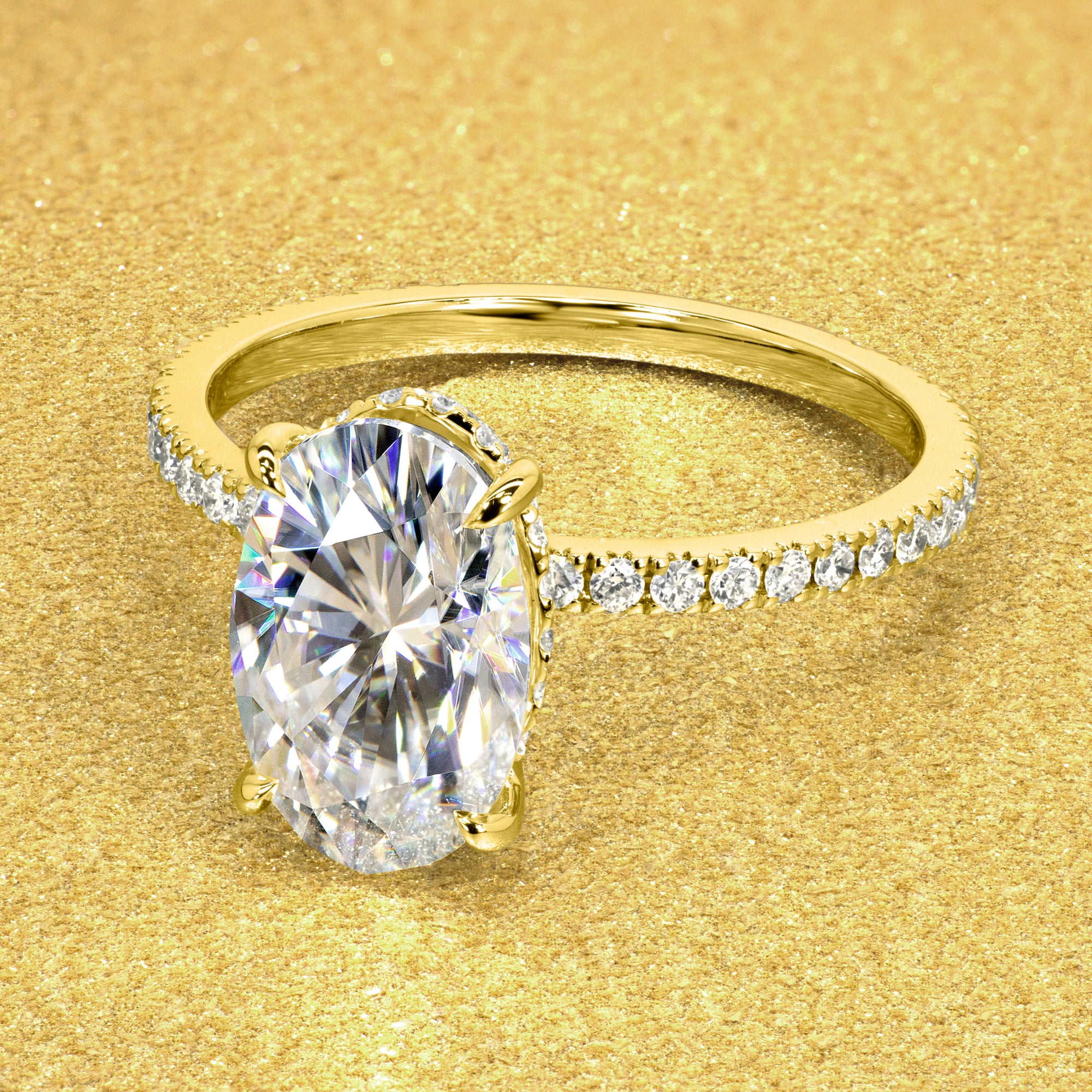 The Stella 3ct Elongated Oval-cut Moissanite and Lab-grown Diamond Hidden Halo Engagement Ring handcrafted in Beverly HIlls by Earthena Jewelry.