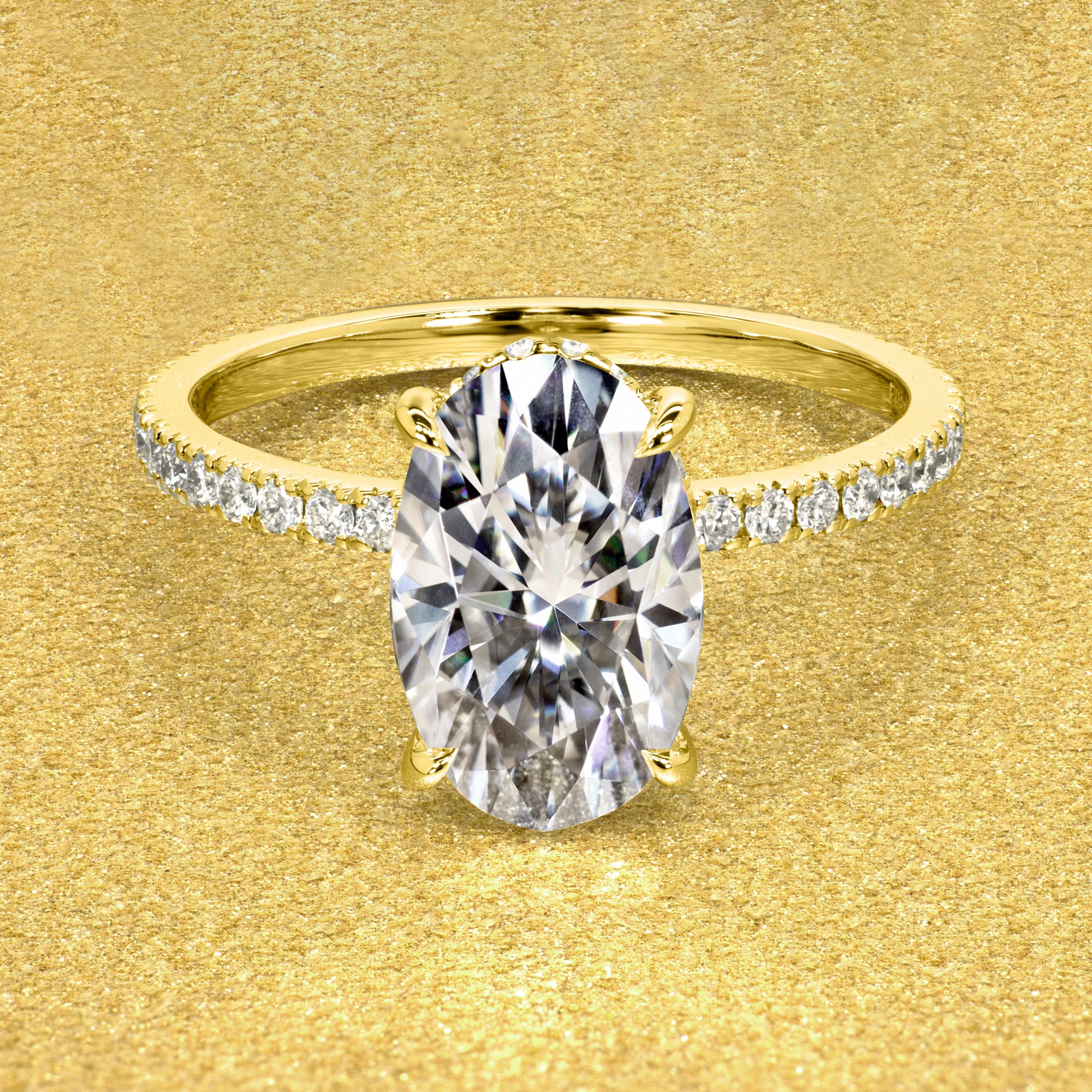 The Stella 3ct Elongated Oval-cut Moissanite and Lab-grown Diamond Hidden Halo Engagement Ring handcrafted in Beverly HIlls by Earthena Jewelry.