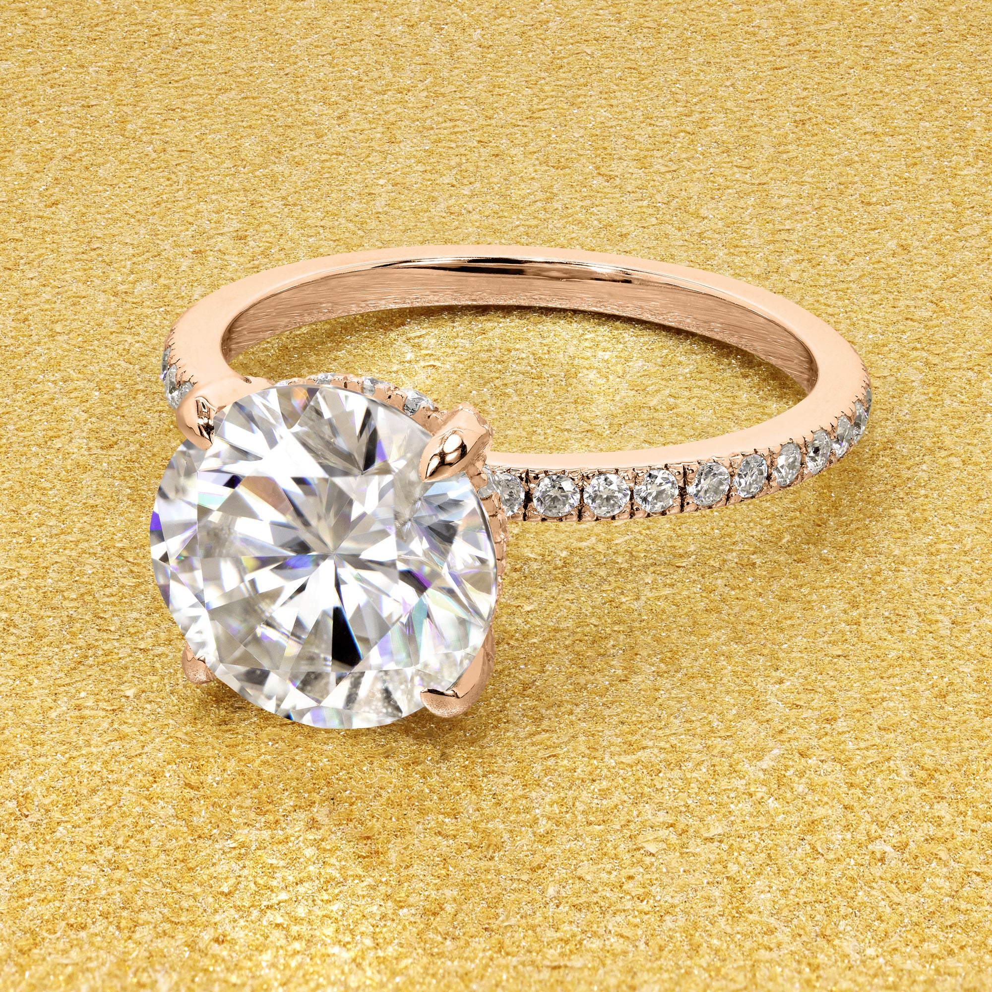 Classic and elegant 3ct Round Brilliant-cut Moissanite and Lab Diamond Hidden Wrap Halo engagement ring handcrafted in 14K gold, 18K Gold, or Platinum handcrafted in Los Angeles by Earthena Jewelry.