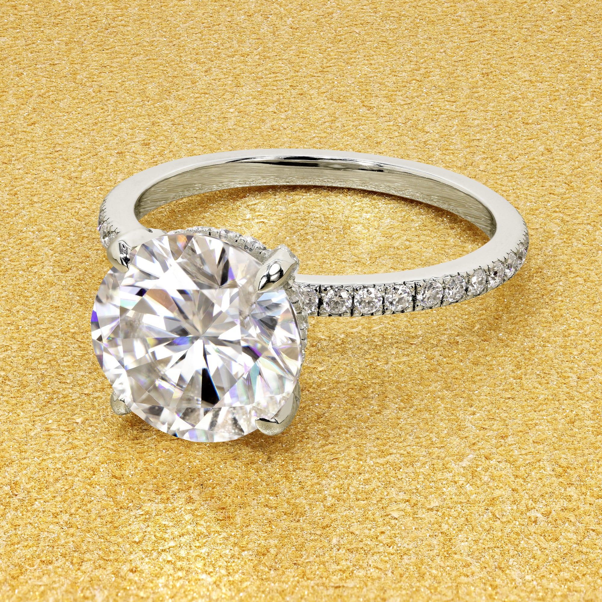 Classic and elegant 3ctRound Brilliant-cut Moissanite and Lab Diamond Hidden Wrap Halo engagement ring handcrafted in 14K gold, 18K Gold, or Platinum handcrafted in Los Angeles by Earthena Jewelry.