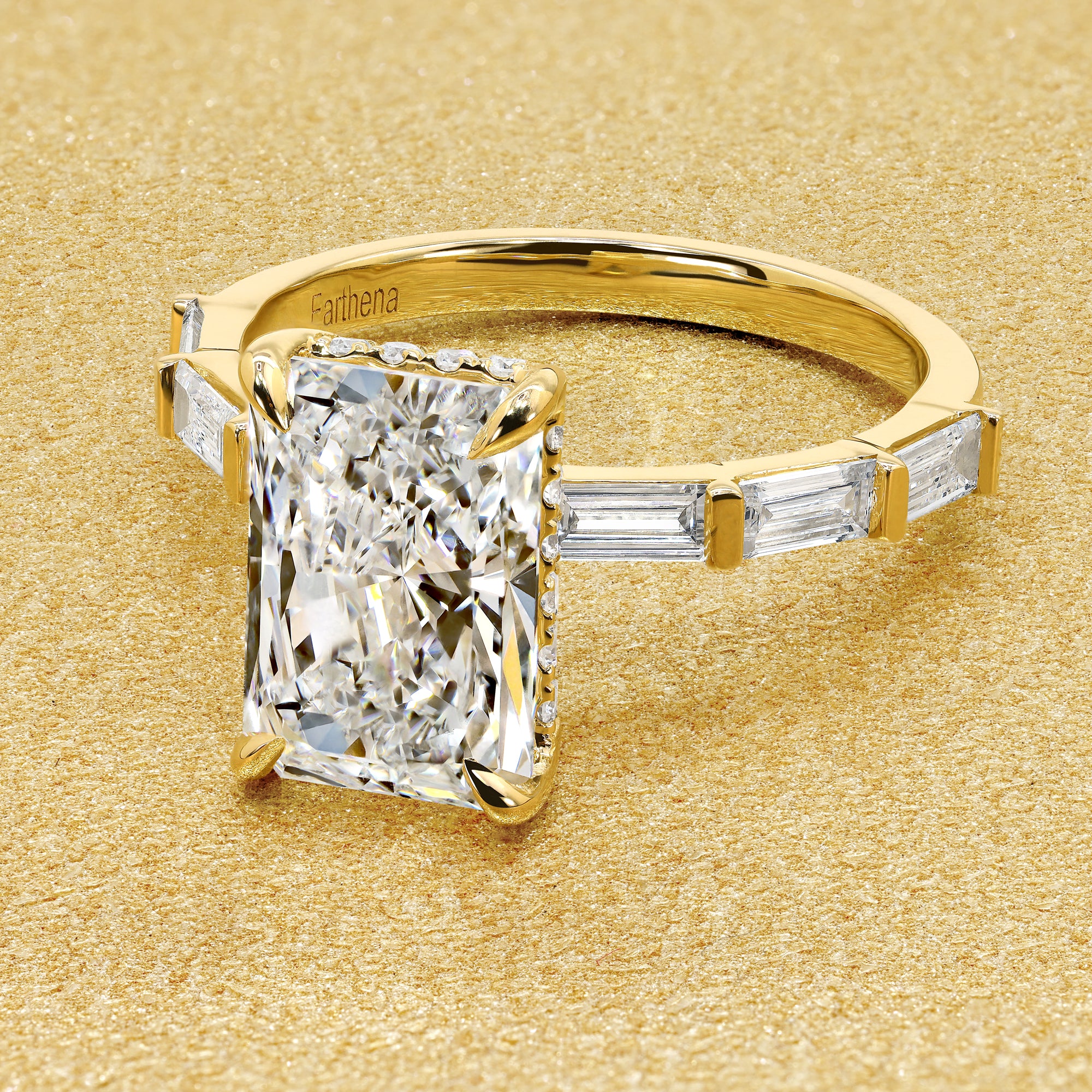 The Taylor, 3ct Elongated Radiant-Cut Lab-Grown Diamond Hidden Halo Baguette Engagement Ring in 14K Gold, 18K Gold, or Platinum by Earthena Jewelry of Beverly Hills.