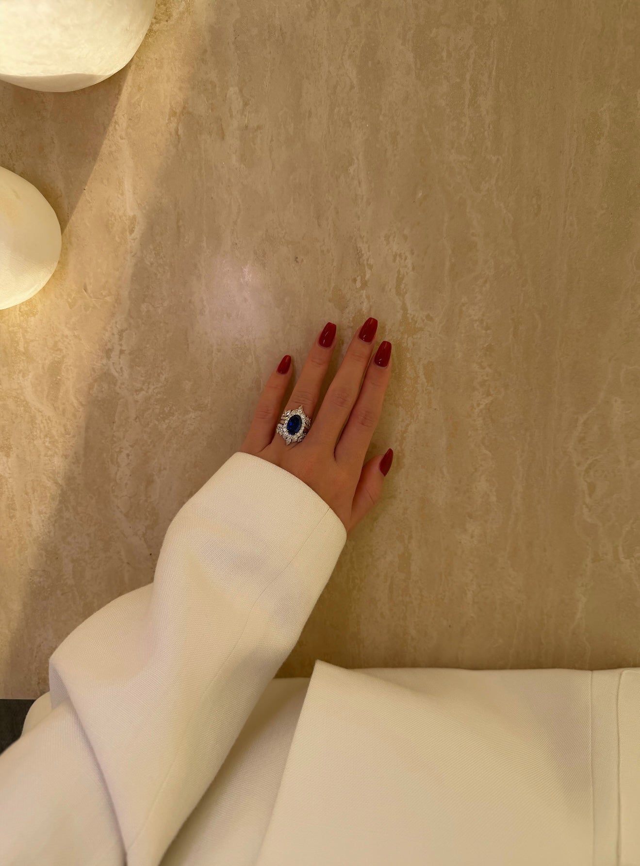 Gloria 4ct Oval Lab-Grown Royal Blue Sapphire with Dual Isabella V-Shaped Diamond Bands in 14K Gold, 18K Gold, or Platinum by Earthena Jewelry of Beverly Hills.