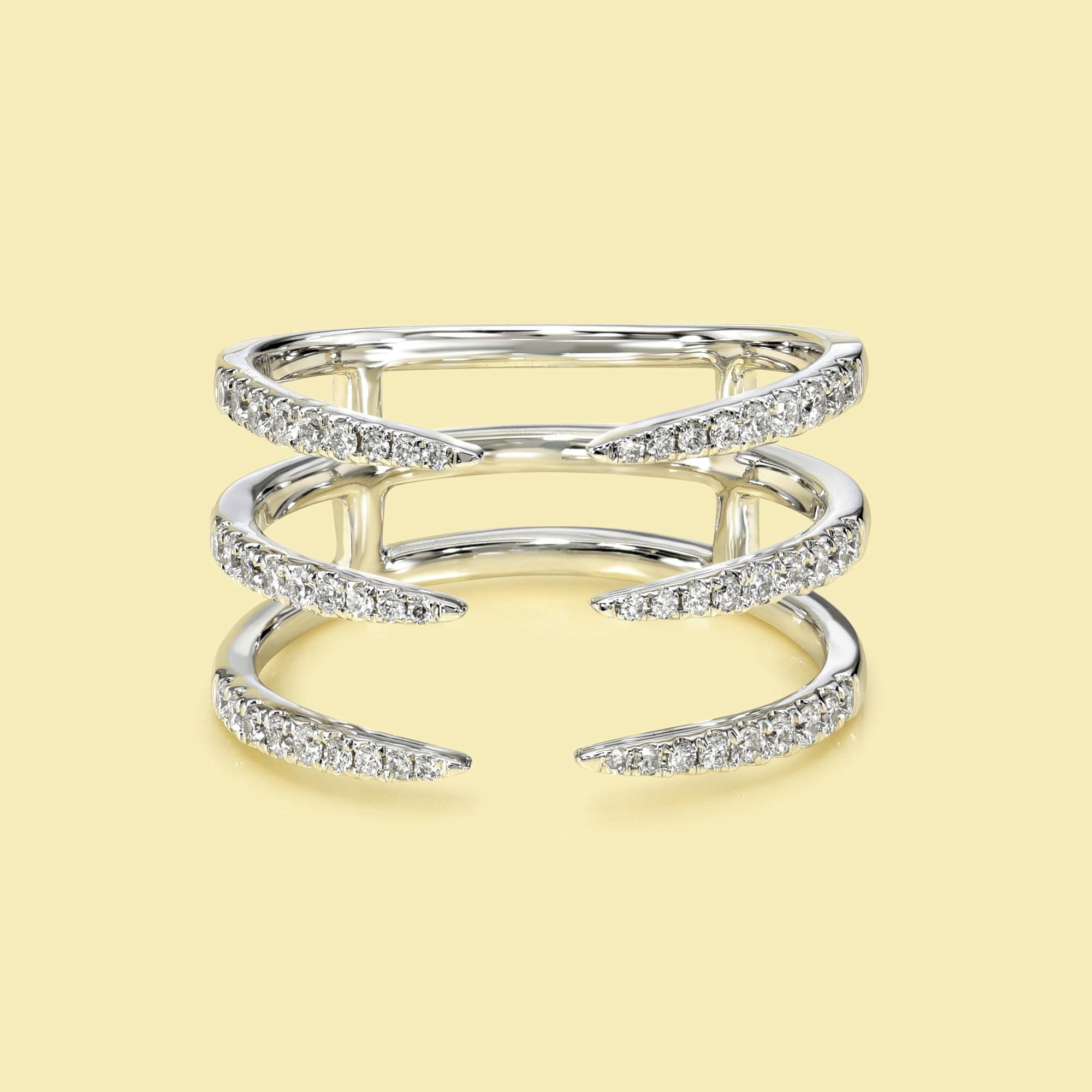 The Vi, Open Triple Row Diamond Cuff Band is handcrafted in 14K gold, 18K gold, or Platinum by Earthena Jewelry in Los Angeles