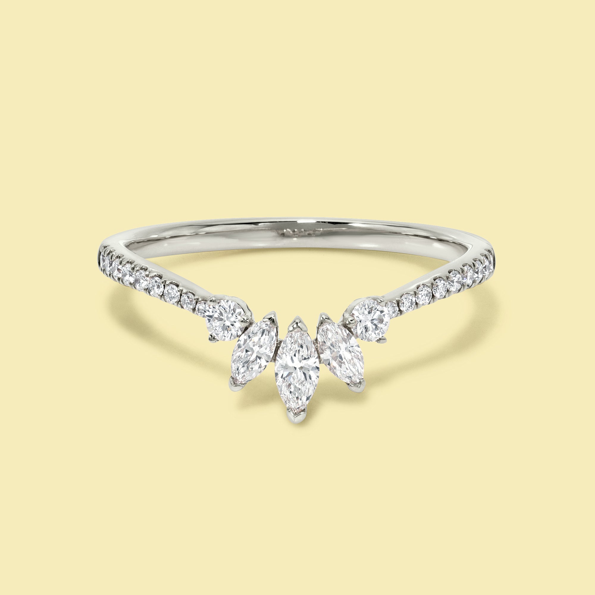 The Victoria, V-shaped Curved Diamond Band is handcrafted in 14K gold, 18K gold, or Platinum by Earthena Jewelry in Los Angeles