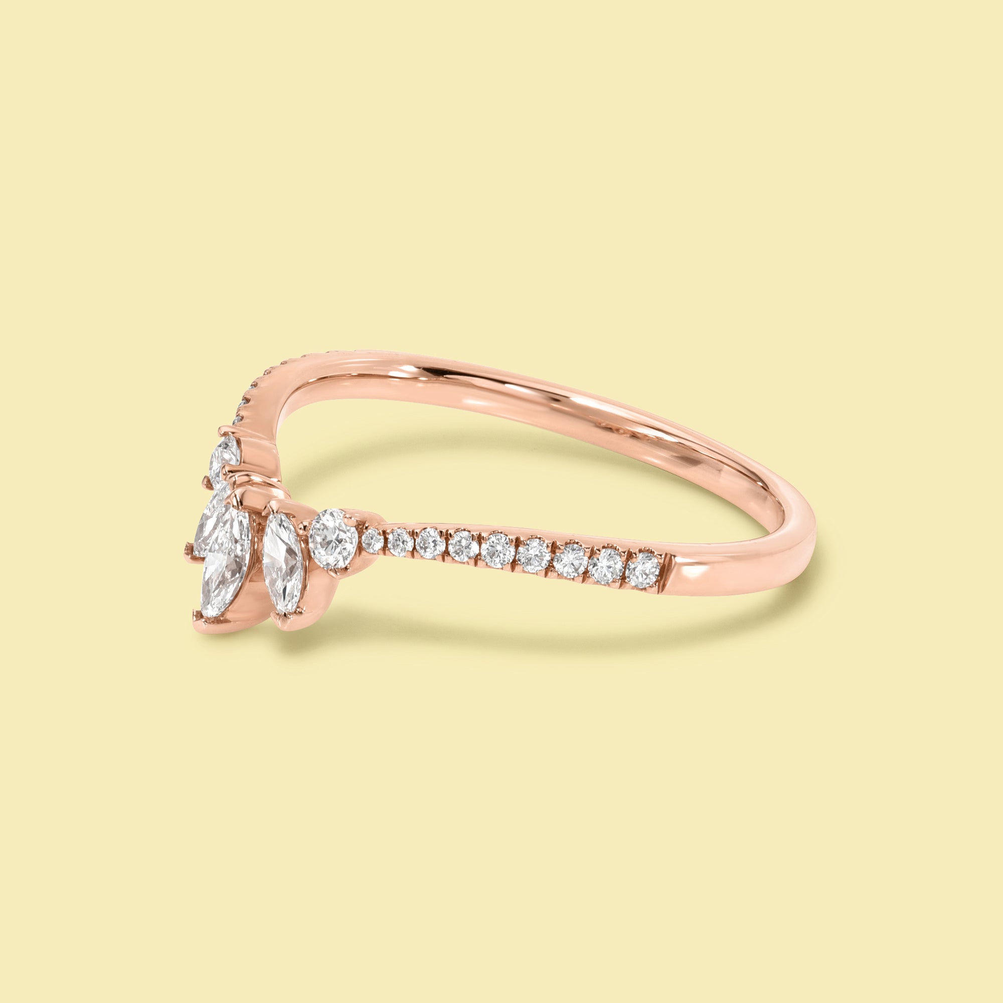 The Victoria, V-shaped Curved Diamond Band is handcrafted in 14K gold, 18K gold, or Platinum by Earthena Jewelry in Los Angeles