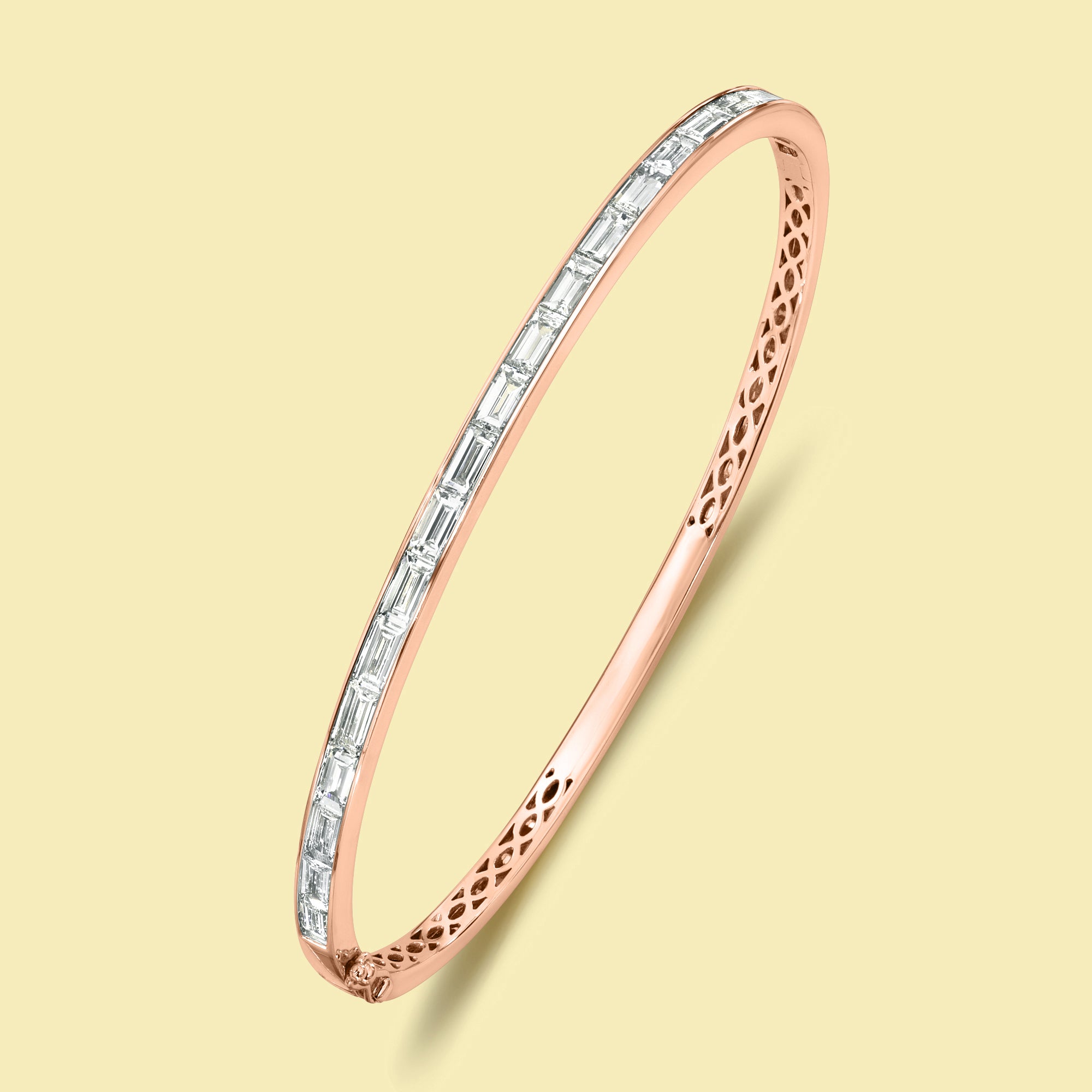 The Zoe, Classic Baguette Diamond Bangle is handcrafted in 14K gold, 18K gold, or Platinum by Earthena Jewelry in Los Angeles